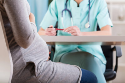 Pregnant woman making labor & delivery plans with CU Medicine OB-GYN East Denver (Rocky Mountain) 